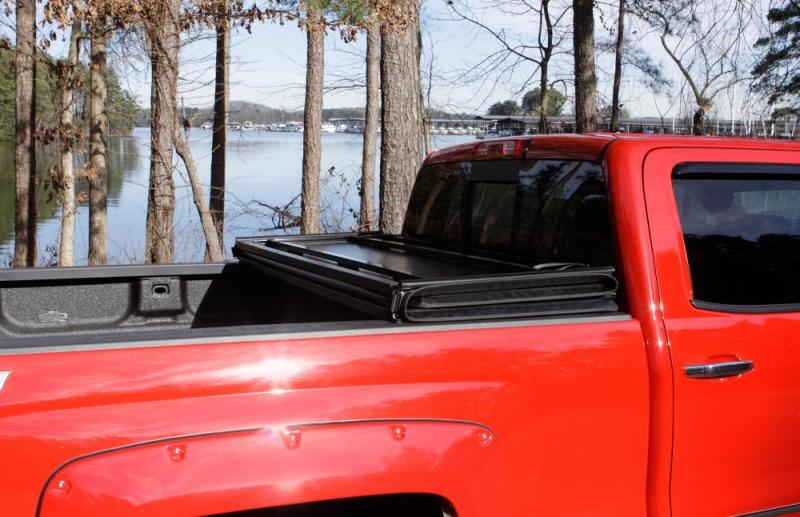 Lund 05-17 Nissan Frontier Styleside (5ft. Bed) Hard Fold Tonneau Cover - Black