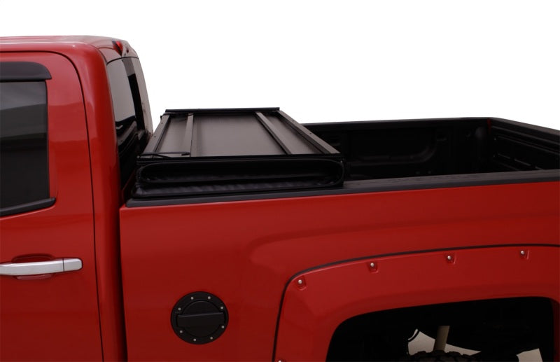 Lund 05-15 Toyota Tacoma Fleetside (6ft. Bed) Hard Fold Tonneau Cover - Black